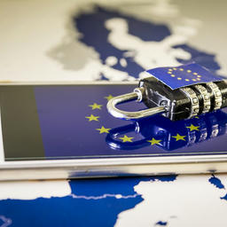 Smartphone and padlock on top of an EU map, representing the level of data protection required to be in compliance with the General Data Protection Regulation (GDPR).